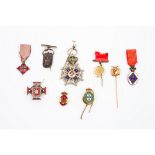 A group of nine medals and insigniasMetal Enamelled decoration 20th century