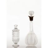 A three piece setWith: a two piece cruet set and a bottle with silver cover and mounts Iridescent