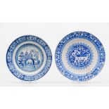 A set of two platesFaience Blue decoration One with a sheep and child, the other with landscape with