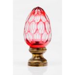 A staircase finialMirrored red glass Yellow metal fitting Possibly Baccarat or Saint Louis France,