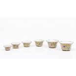 A group of six bowlsEnamel on copper Polychrome floral decoration China, 19th century (losses,