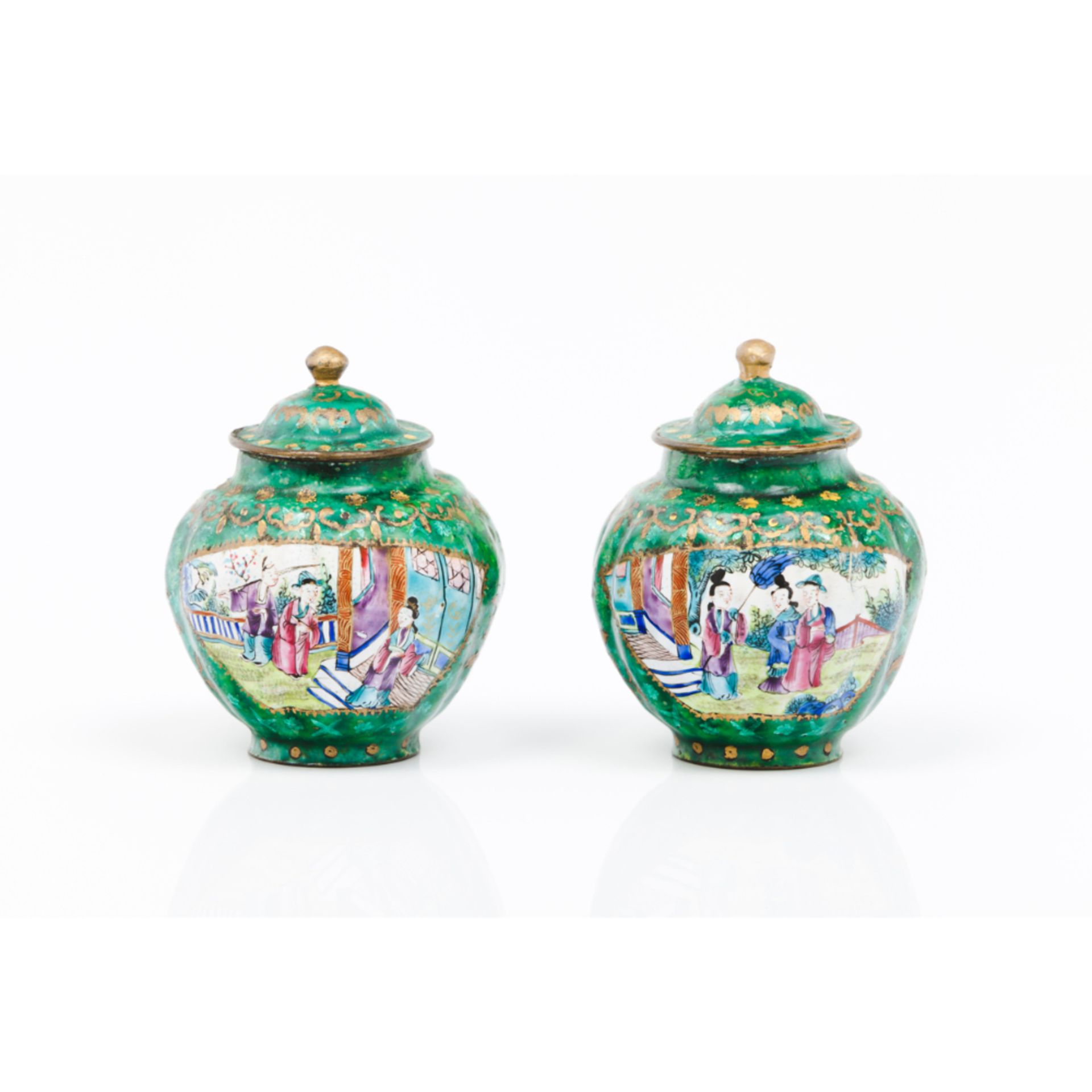 A pair of small pots and coversEnamel on copper Polychrome decoration and frames with Chinese