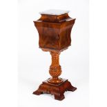 A Romantic bedside cabinetIn mahogany and mahogany veneer Turned shaft One door and marble top
