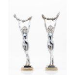 A pair of Art Deco style female figuresChrome metal Marble stands Signed "Limousin" (losses,