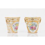 A pair of cachepotsPorcelain Polychrome and gilt decoration of flowers and other foliage motifs
