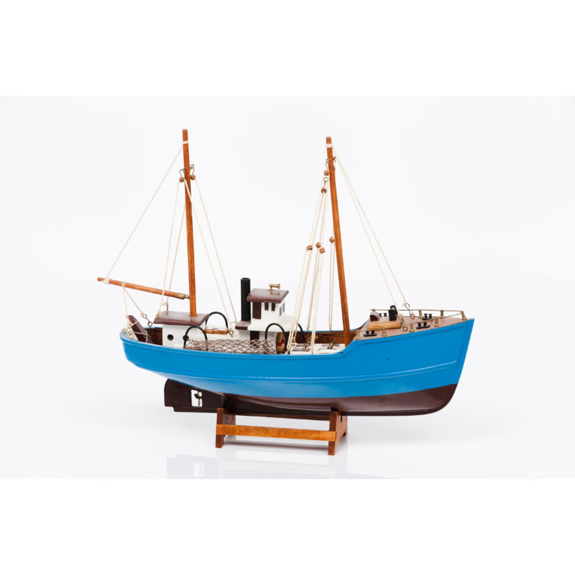 A model fishing boatWood, metal and other materials 20th century34x42 cm