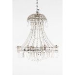 A ten branch chandelierMetal frame and moulded and cut glass90x75 cm