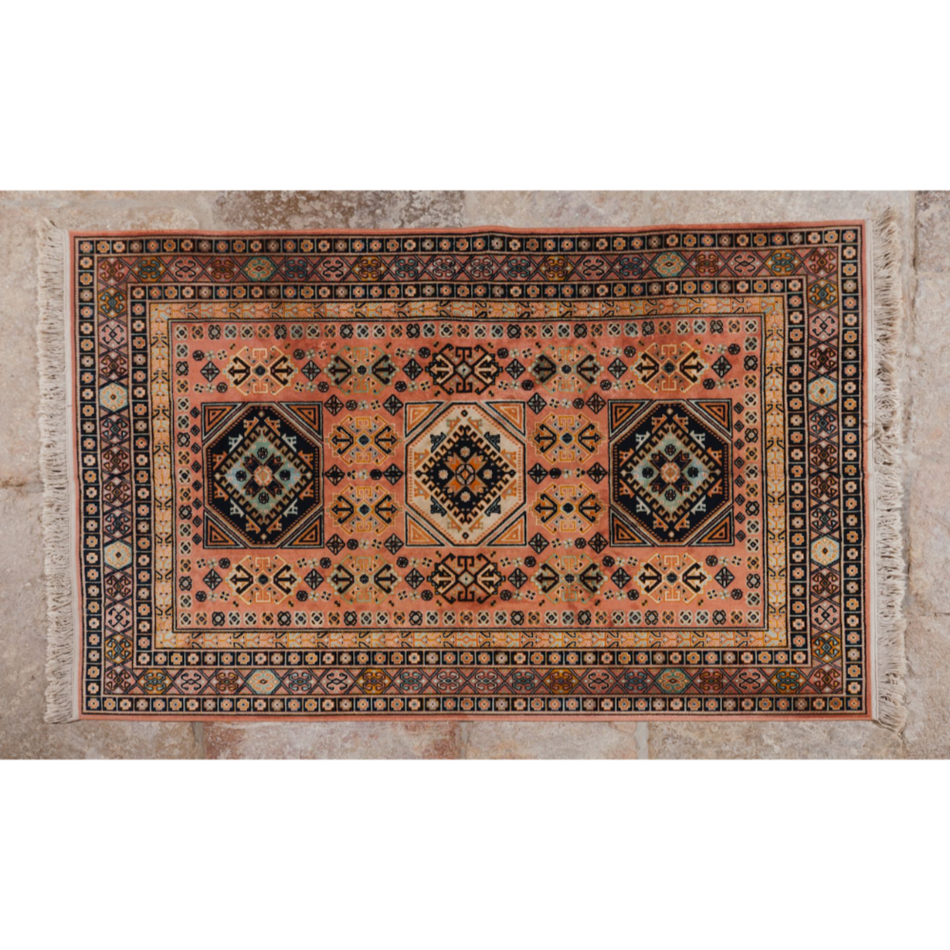 Oriental style rugGeometric design in shades of salmon and blue (signs of wear)200x140cm