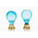 A set of two staircase finials Blue cut glass Yellow metal fitting Possibly Baccarat or Saint