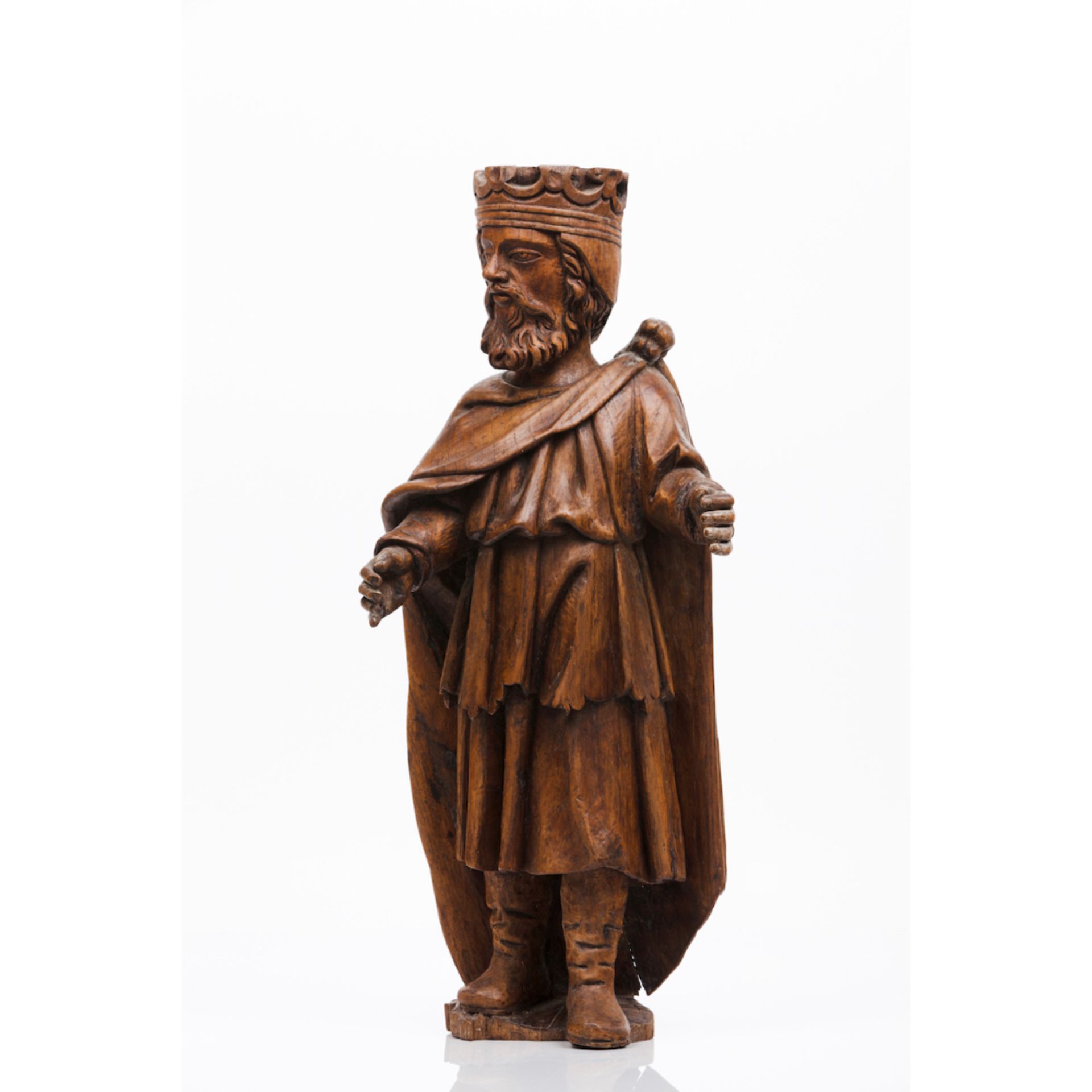 A kingCarved wood Portugal, 18th century (losses, faults and restoration) Height: 59 cm