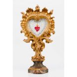 The Sacred Heart of ChristPart marbled and gilt carved wood Europe, 18th century Central 20th