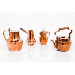 A group of four piecesTwo jugs, one kettle and one chocolate pot Copper, pewter lined interior