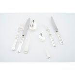 A twelve cover cutlery setPortuguese silver, 19th / 20th century Soup spoons, meat knives and forks,