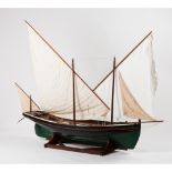 A model sailboatWood, metal and textile Wooden display stand 20th century160x226 cm