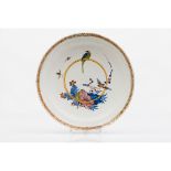 A plateFaience Polychrome floral and bird decoration Holland, 18th centuryDiam.: 34,5 cm