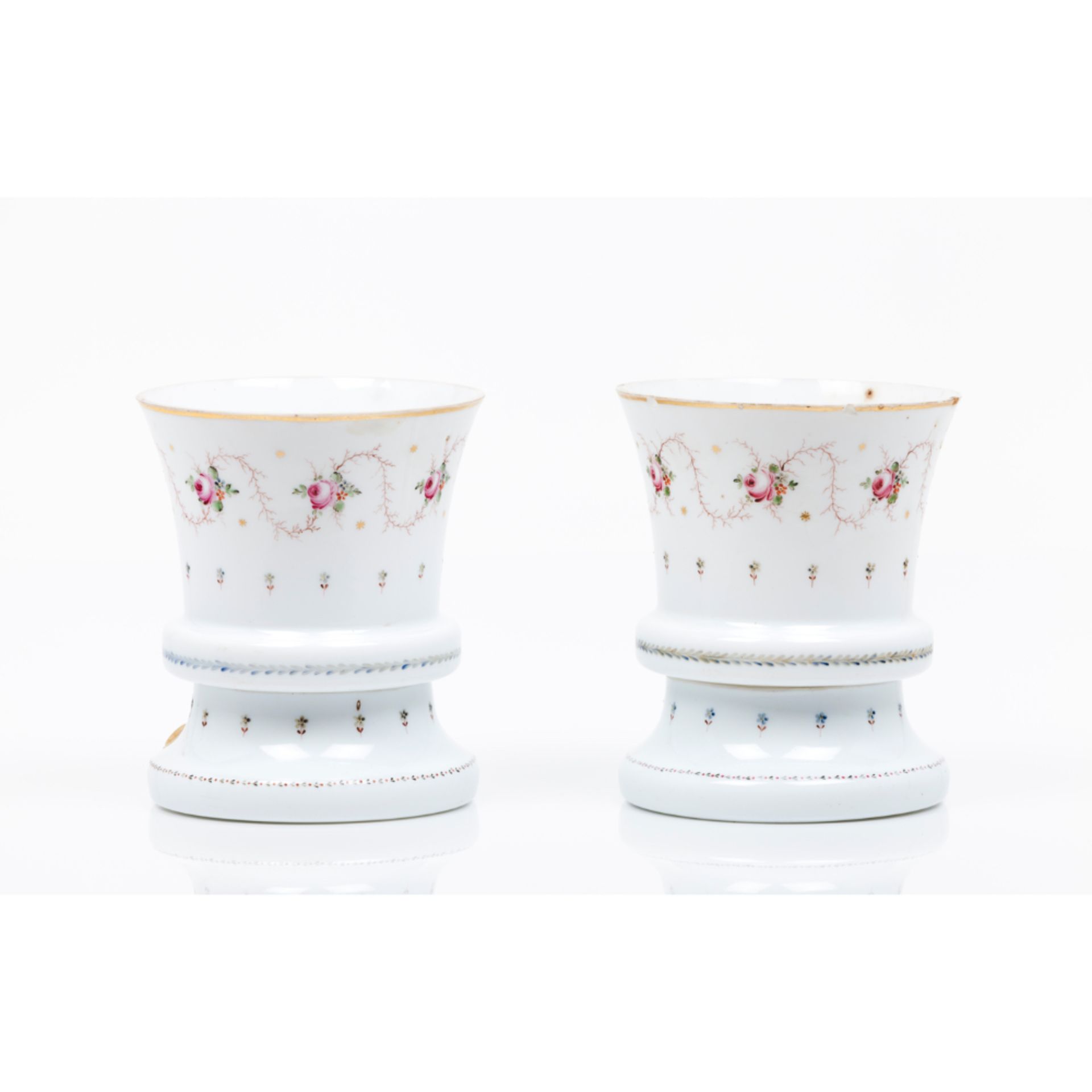 A pair of cachepotsWhite opaque glass Floral polychrome and gilt decoration Europe, 19th century (