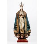 An important Virgin of the Immaculate ConceptionCarved, painted and gilt sculpture The Virgin is