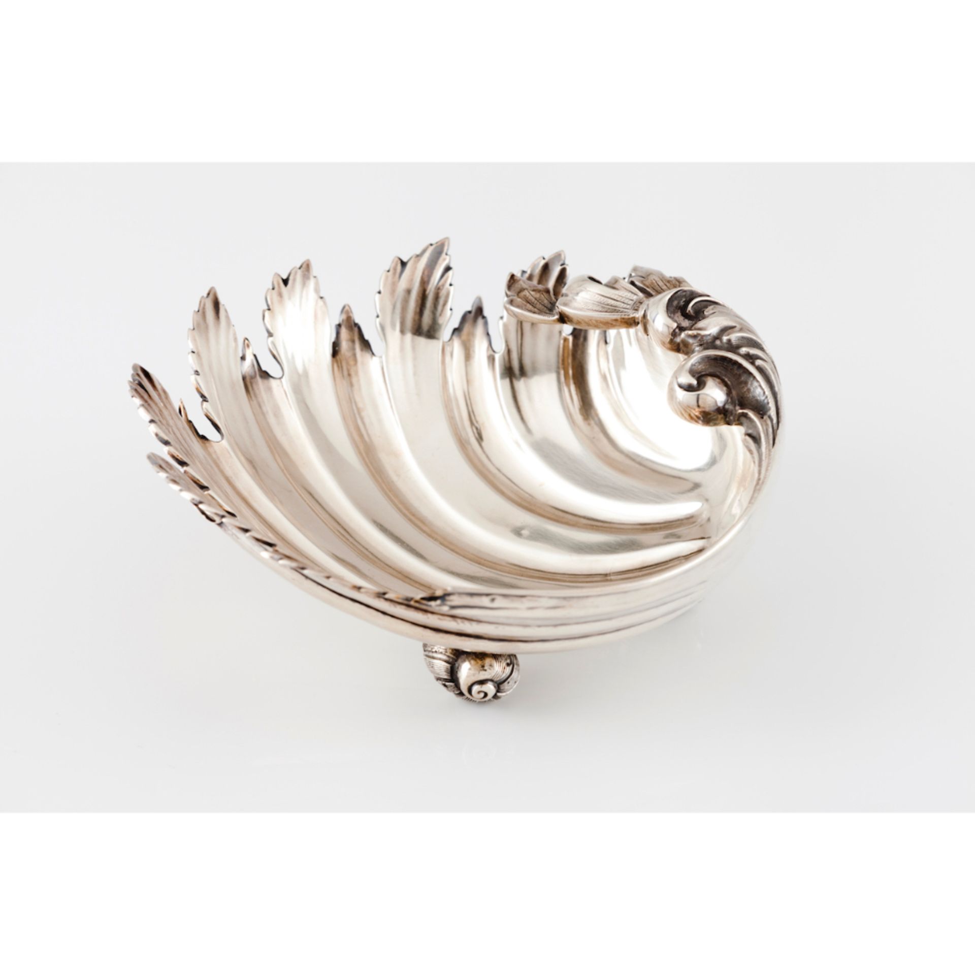 A leaf shaped bowl Portuguese silver On 3 snail shaped feet Eagle hallmark 833/1000 (1938-1985)