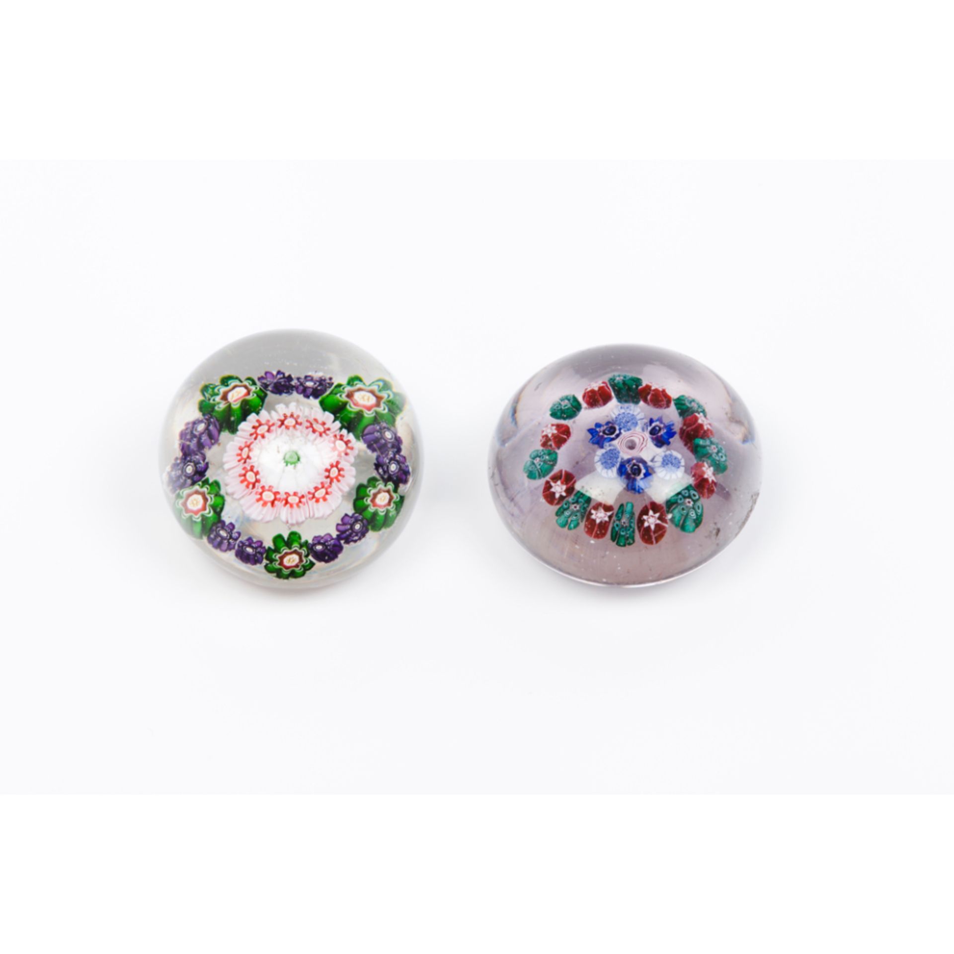 A group of two paperweightsGlass paste Inner "millefiori" decoration France, 20th century (faults)