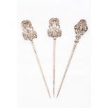 A set of three "épingles à cheveux"French silver, 19th century, unmarked in compliance with Decree-