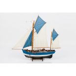 A "Thonier" model fishing sailboatWood, metal and textile Wooden display stand57x62,5 cm