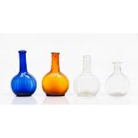 A group of four bottles Blue, orange and translucent glass Lobate decoration Europe, 18th / 19th