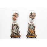 A pair of sculptural compositionsCarved, polychrome and gilt wooden sculptures In a composition of