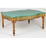 A large Neoclassical centre tableWood Gilt, carved and marbled decoration Scalloped top in green