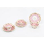 A set of three cups and saucersPorcelain Floral polychrome and gilt decoration Europe, 19th