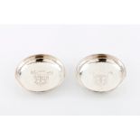 A pair of small containers Portuguese silver Hammered decoration engraved with Portuguese heraldic