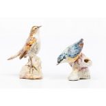 A pair of birdsGlazed ceramic sculptures Polychrome decoration Signed "DINIZ PORTUGAL"Height: 13,5cm
