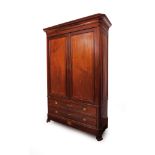 A Romantic Era cupboard/wardrobeIn Brazilian mahogany and mahogany root With two doors, two