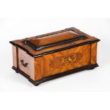 A chestWalnut, oak, satinwood, dyed and ebonised timbers Inlaid decoration of floral and heraldic