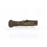 An iron axeCast iron Iron Age (1200 BCE - 332 BCE) (losses, faults and oxidization)Length: 15,5 cm