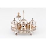 An inkwellPortuguese silver, 18th/19th century Galleried hexagonal shaped with bell and candle stick