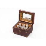 A small boxWood Yellow metal inlaid decoration Interior with mirror and six glass perfume bottles
