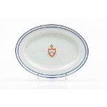 An oval serving platterChinese export porcelain Blue and gilt decoration of central heraldic