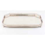 A large galleried tray Portuguese silver Rectangular shaped of cut corners Plain centre and