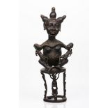 A female figure and two childrenMetal sculpture Africa, 20th century (losses and faults)Height: 80