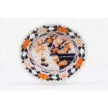 A scalloped deep saucerChinese porcelain Floral polychrome decoration 20th century (chip)4x22x26,5