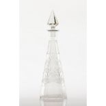 A bottle with stopperEngraved and cut glass of geometric decorationHeight: 36 cm