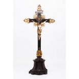 A crucified ChristIndo-Portuguese ivory sculpture Part polychrome and gilt decoration Rosewood cross