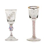 A set of two tall footed glassesMoulded glass Foot with spiralled decoration and glass with gilt