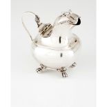 A milk jugPortuguese silver Plain decoration of goat shaped lid pommel On claw and ball feet