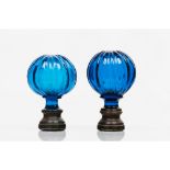 A set of two staircase finials Blue cut glass Metal fittings Possibly Baccarat or Saint Louis