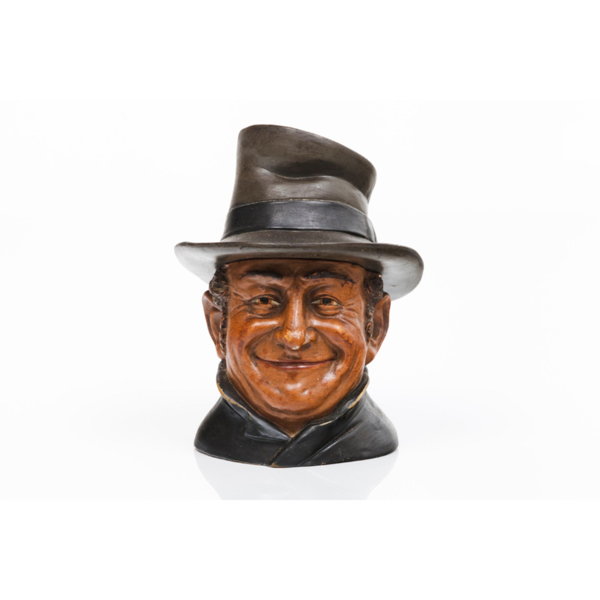 A tobacco jar and cover "Man in a hat"Ceramic Polychrome decoration 20th century (1st half)Height: