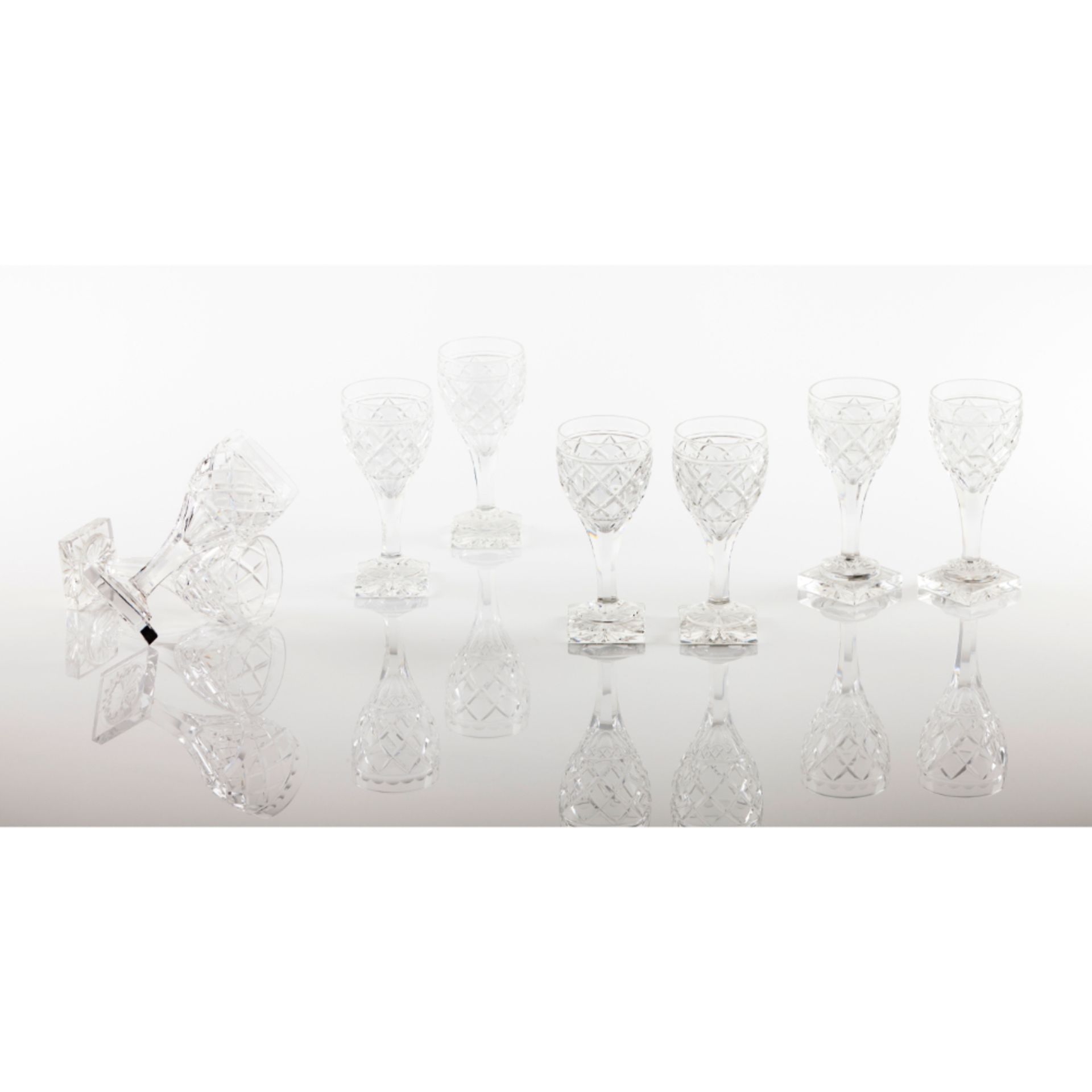 A set of 8 cut crystal Port glasses