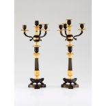 A Louis XVIII period pair of convertible candlesticks