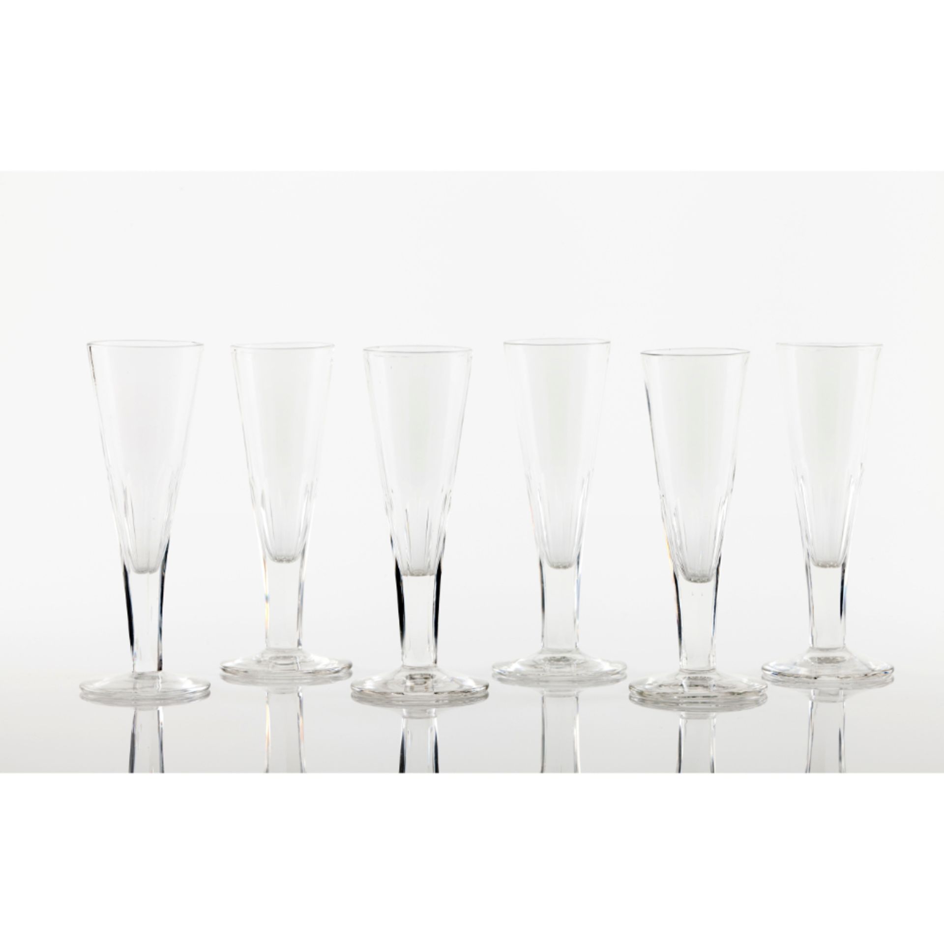 A set of 6 cut crystal champagne flutes