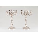 A pair of Louis XVI style four branch candelabra